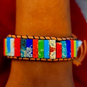 Multi color bracelet with silver accent Brand new no tags